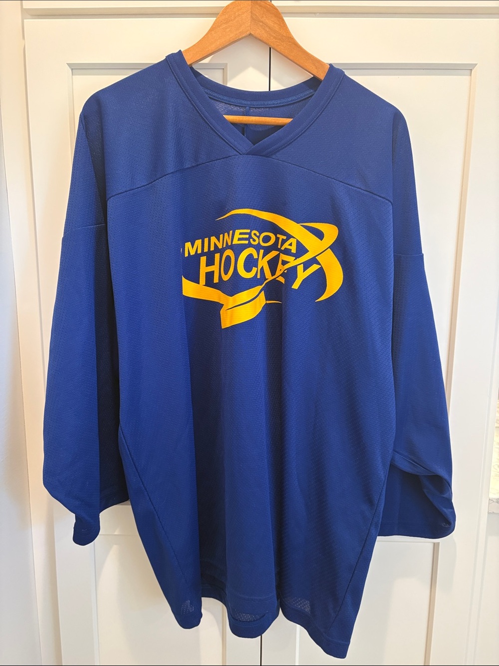 CCM Blue Minnesota Hockey Jersey with Yellow Logo